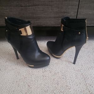 Black and gold booties